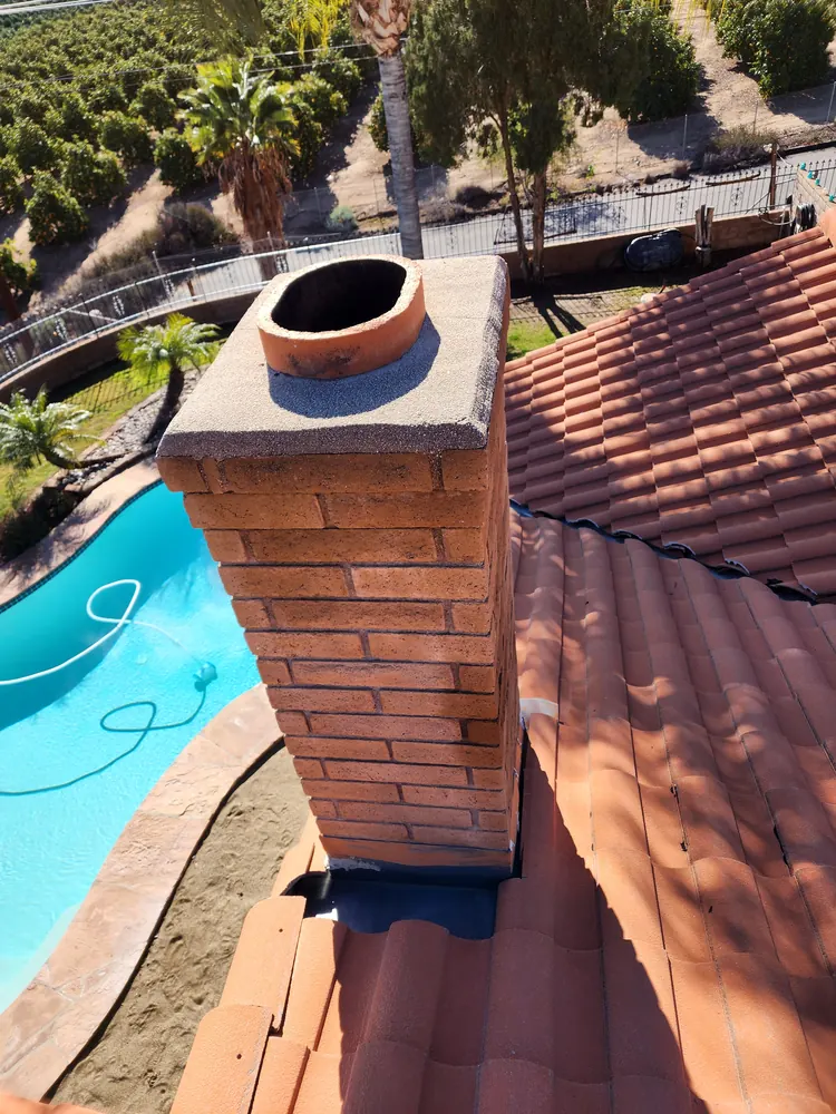 Open clay chimney flue before cap installation